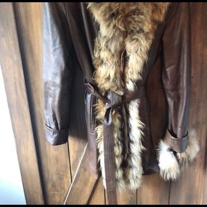 Gorgeous Italian Leather beautiful fur. Removable cuffs .